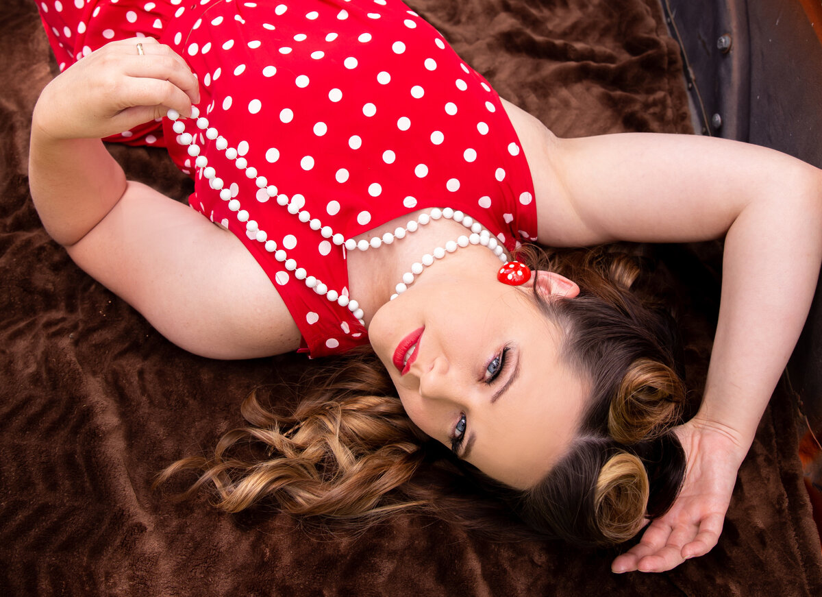 goddess studio boudoir woman pinup polka dots vintage jumper white beads red lipstick pinup hair