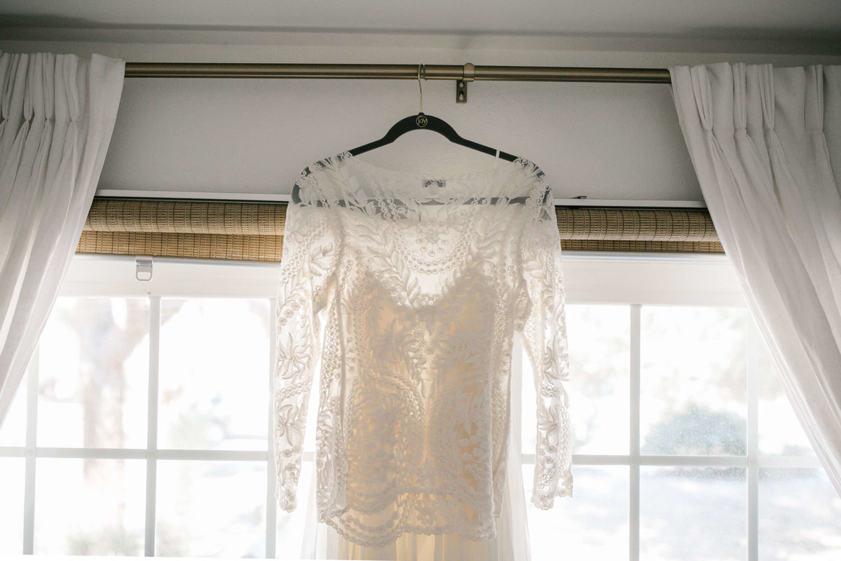 the bridal top hangs on the window