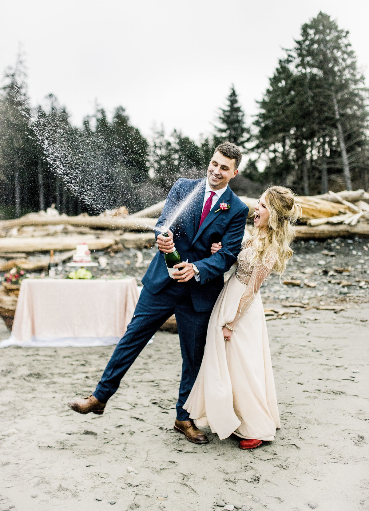 Brandon and Danielle pop  champagne as captured by their elopment photographer