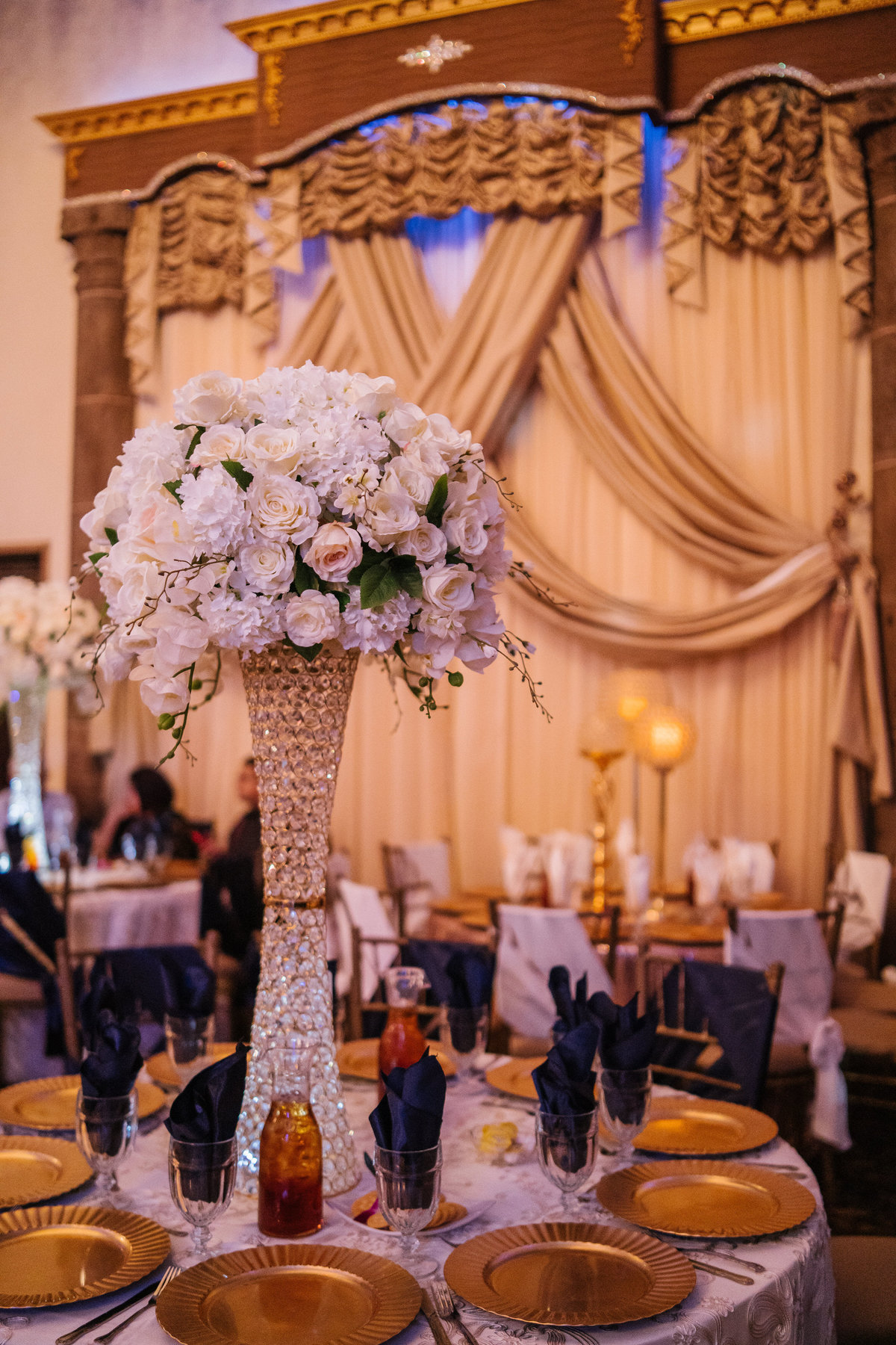 tall table decor and floral vase setting for wedding reception at The Emporium by Yarlen San Antonio