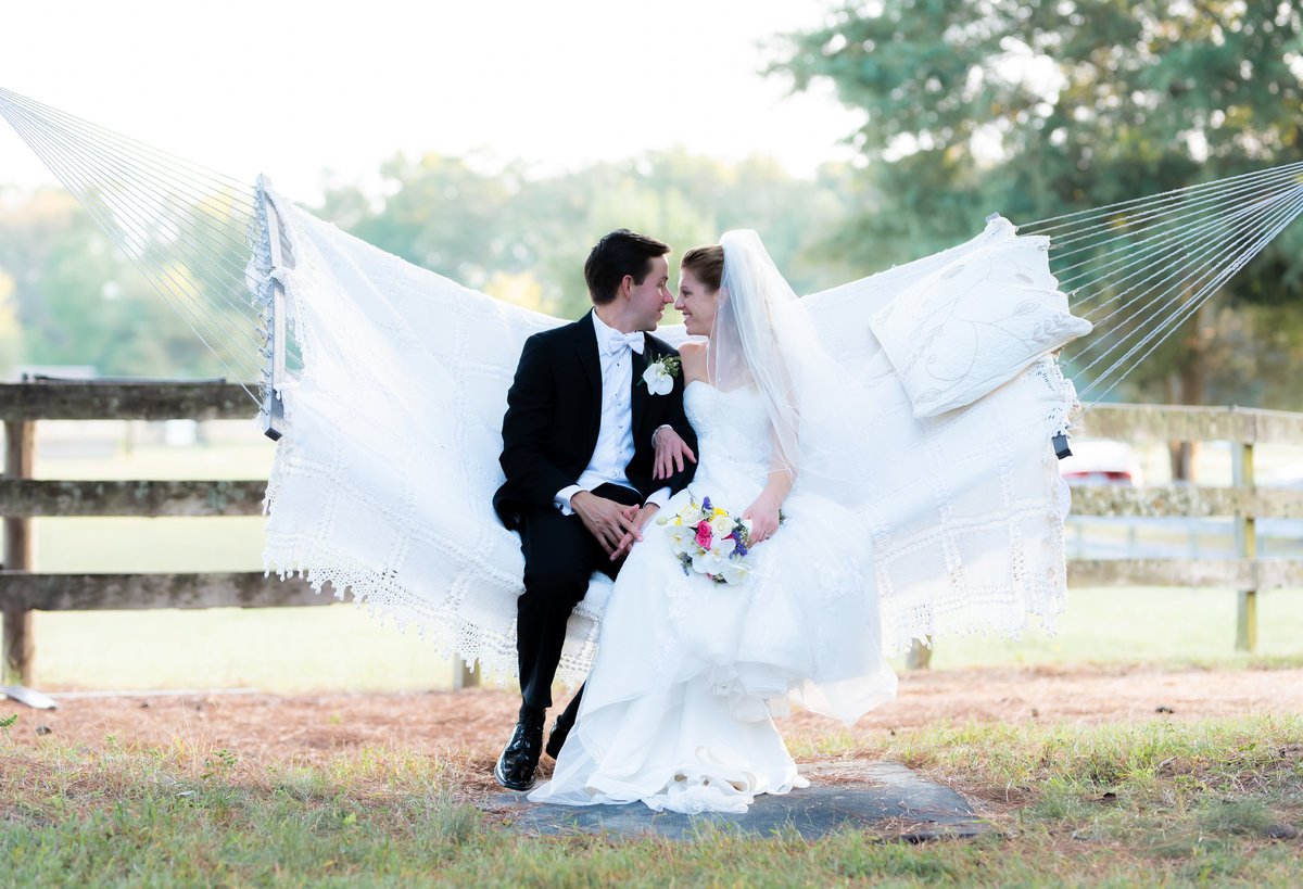 Sweet wedding photo on a hammcok in Richmond, Viriginia.