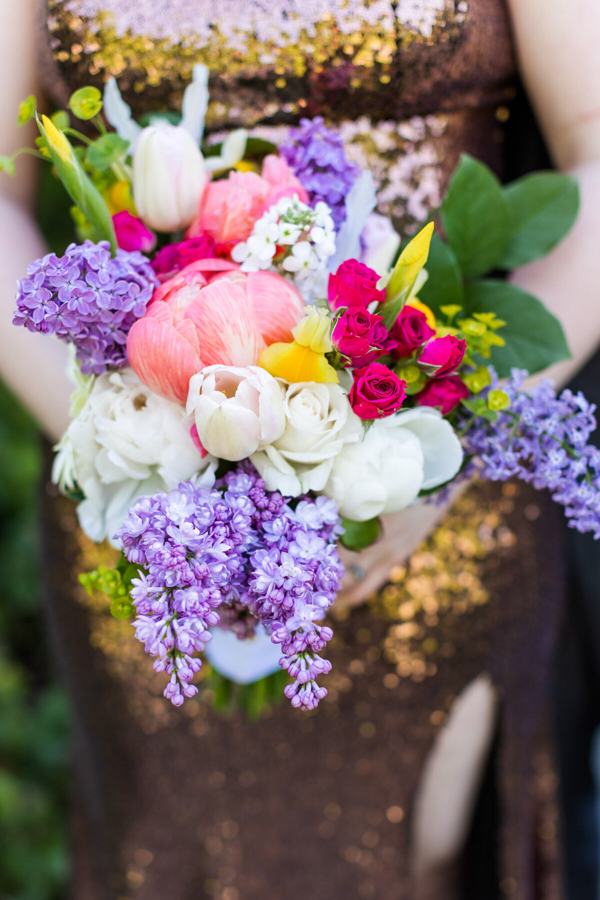 Colorful-bridal-bouquet-with-hyacinths,-roses-and-peonies-at-wedding-at-Willows-Lodge-in-Woodiville,-WA-photo-by-Joanna-Monger-Photography
