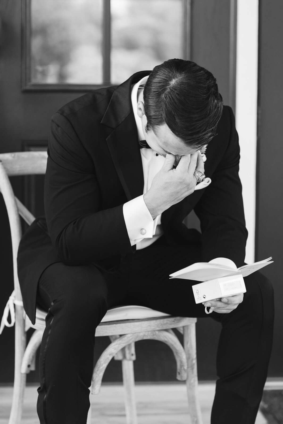 groom-reading-letter-and-crying
