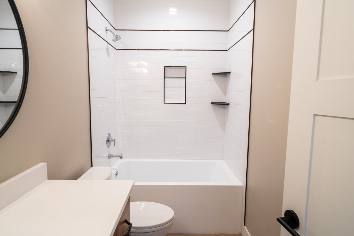 new-house-white-tile-bath