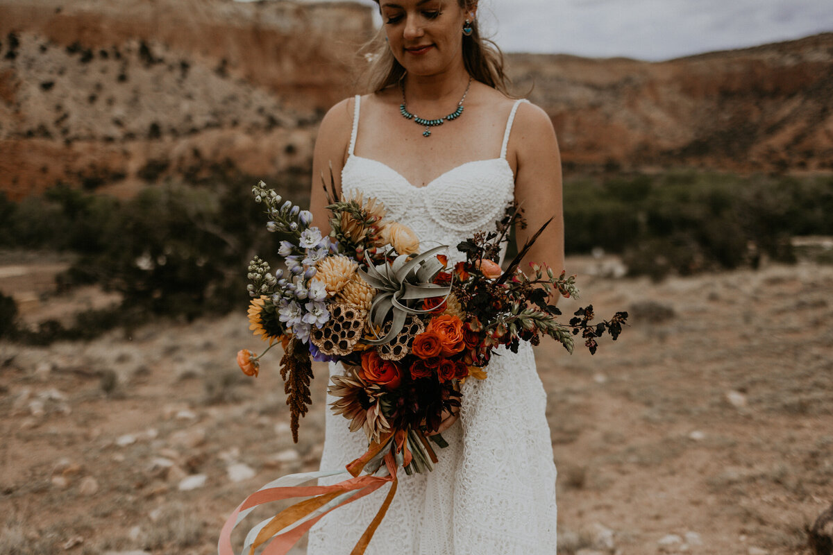 bride holding colorful southwest bouquet