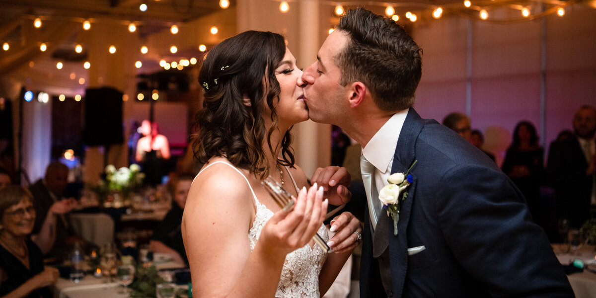 first kiss bride and groom wedding photographer