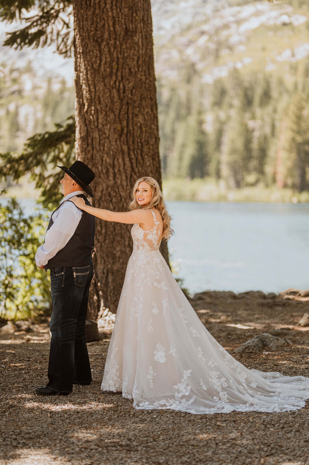 A bride doing a first look at Sardine Lake.