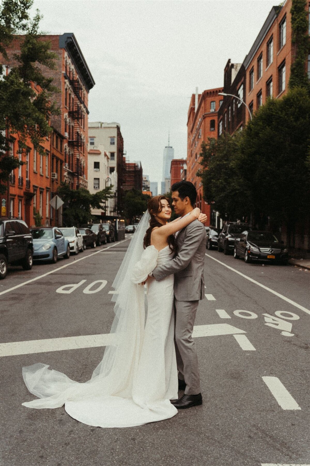 couples photos during wedding in the road