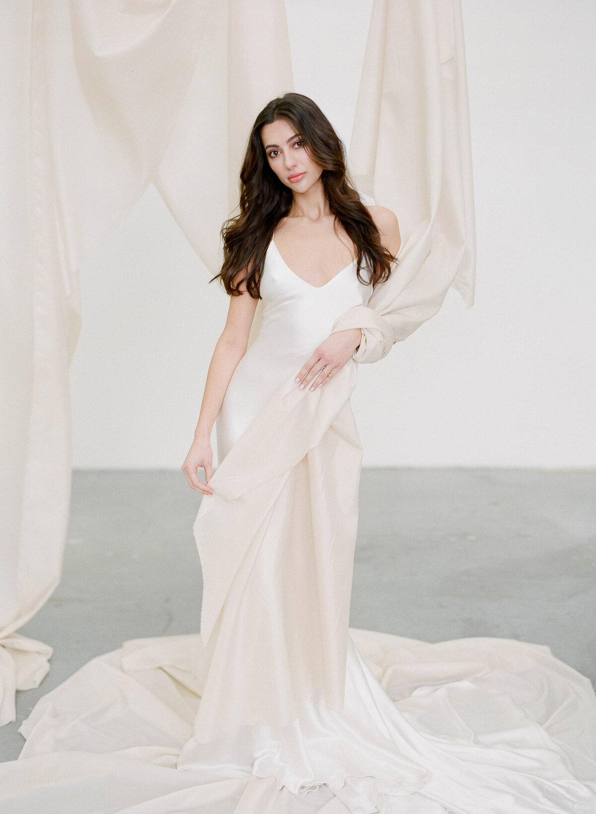 bride in karen willis holmes minimalist wedding gown