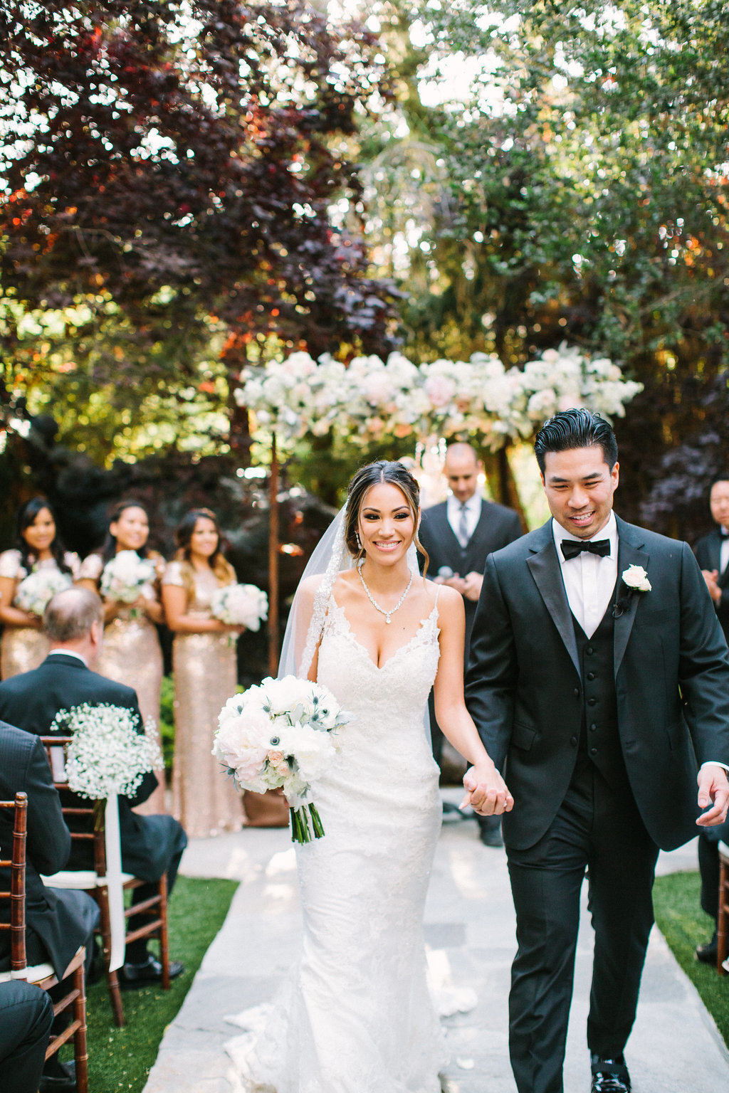 bride and groom exiting the aisle