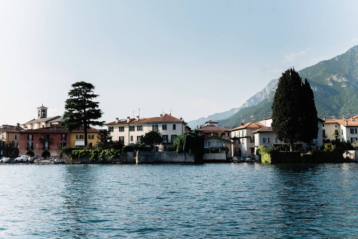 Lake Como with houses and trees in the background