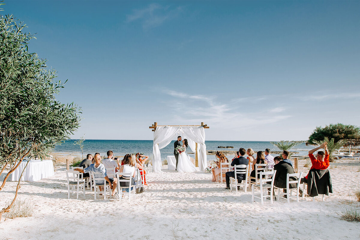 Perfect white sand and a seaview backdrop are the setting for a gorgeous beach wedding