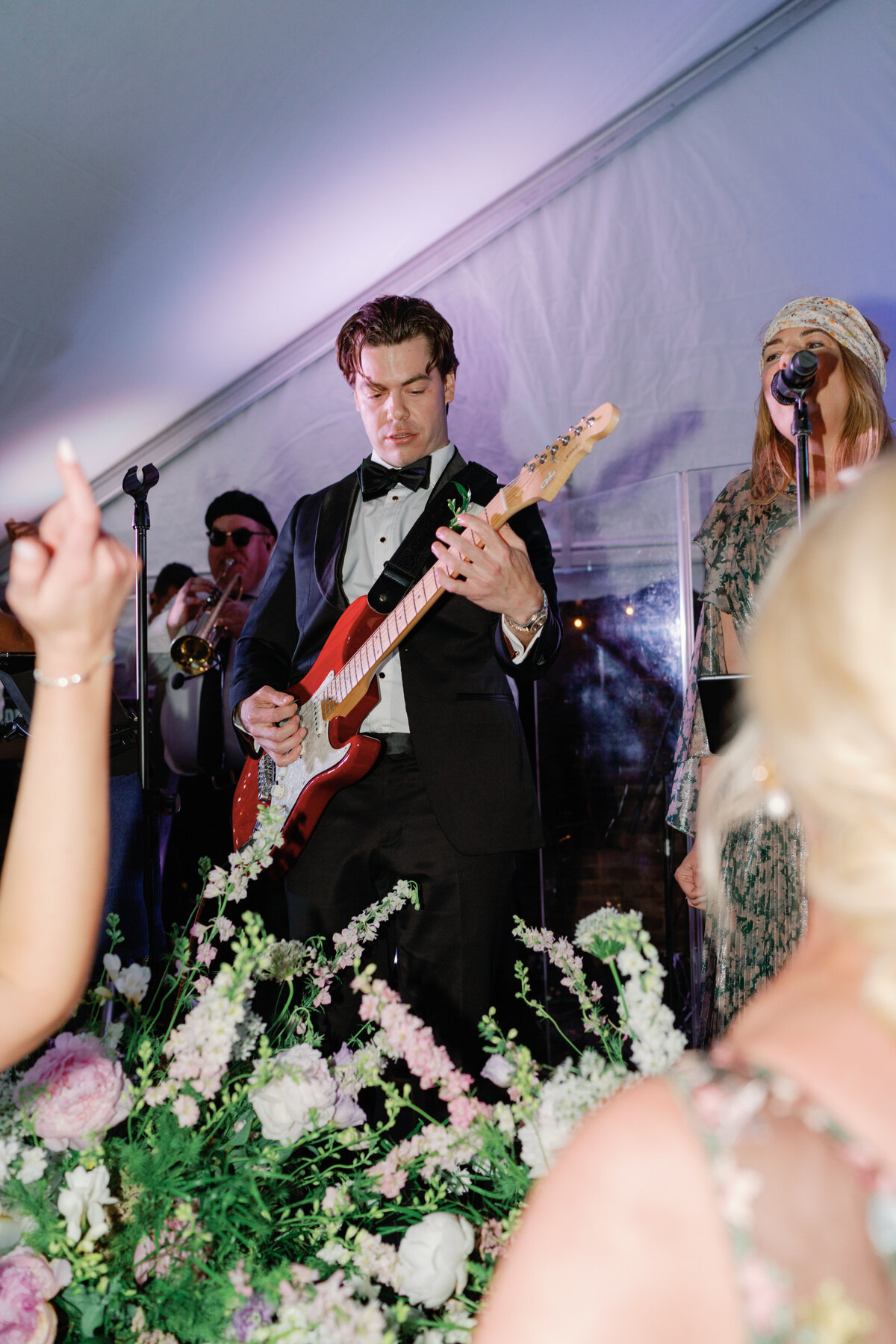 Groom live guitar performance with mom singing vocals at William Aiken House wedding reception in Charleston, SC.