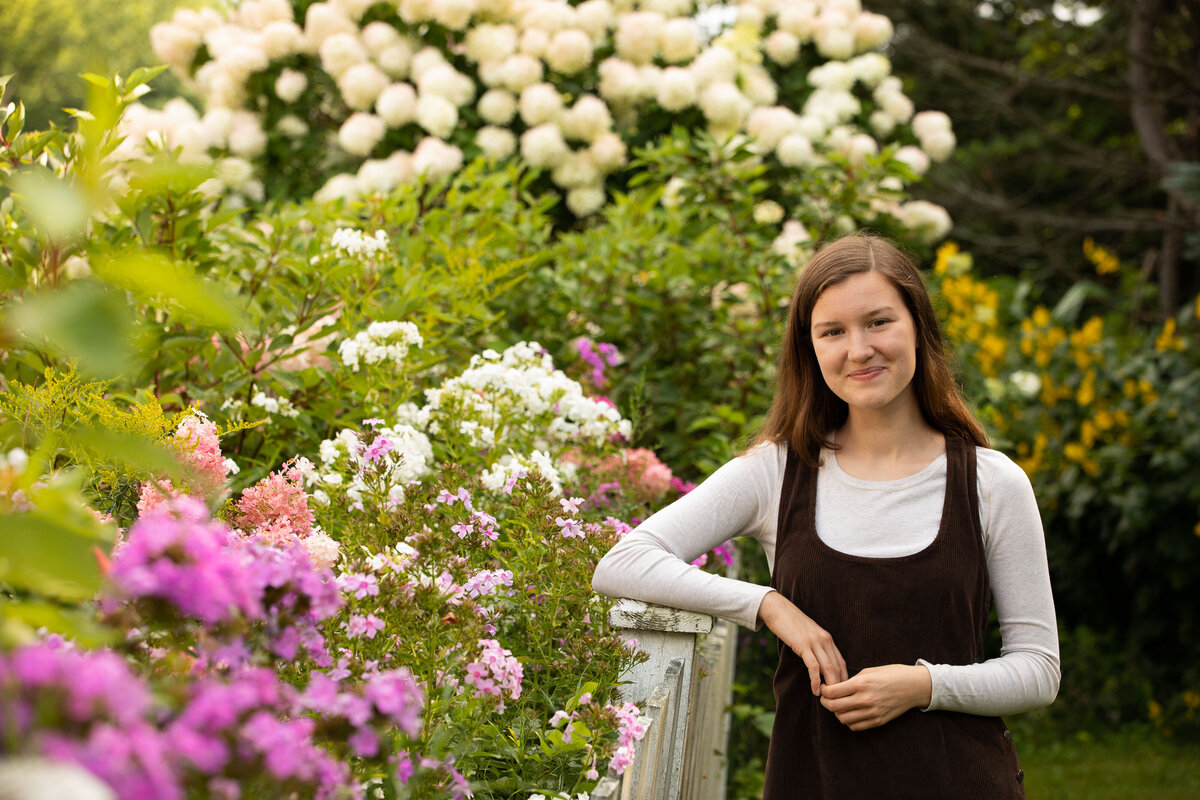 A senior girl in her garden Vermont Senior Portraits