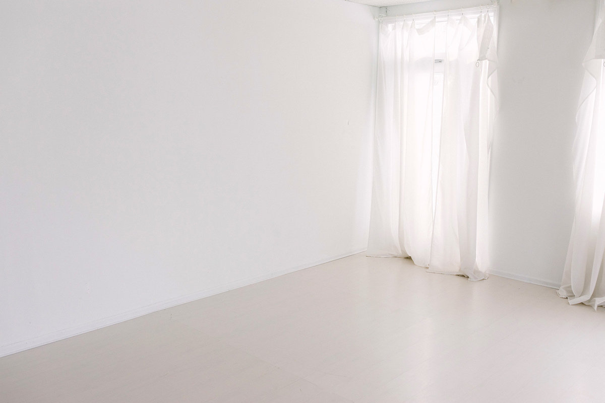 beautiful white floor and white walls in a studio by  Boudoir by Elle