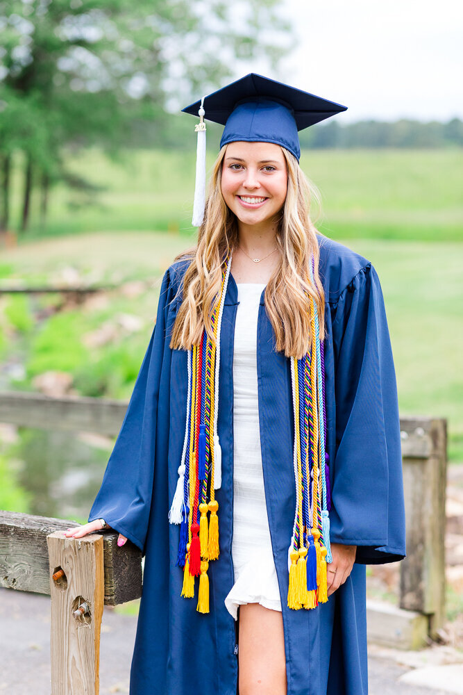 Outdoor High School Senior Cap and Gown portrait session at a park in Raleigh, NC