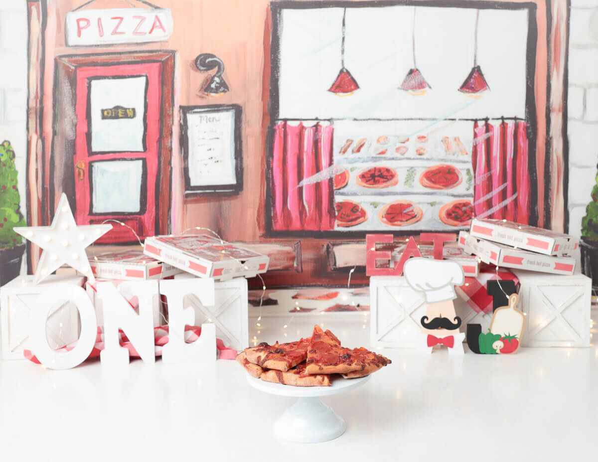 A pizza  themed cake smash in Rochester, NY.