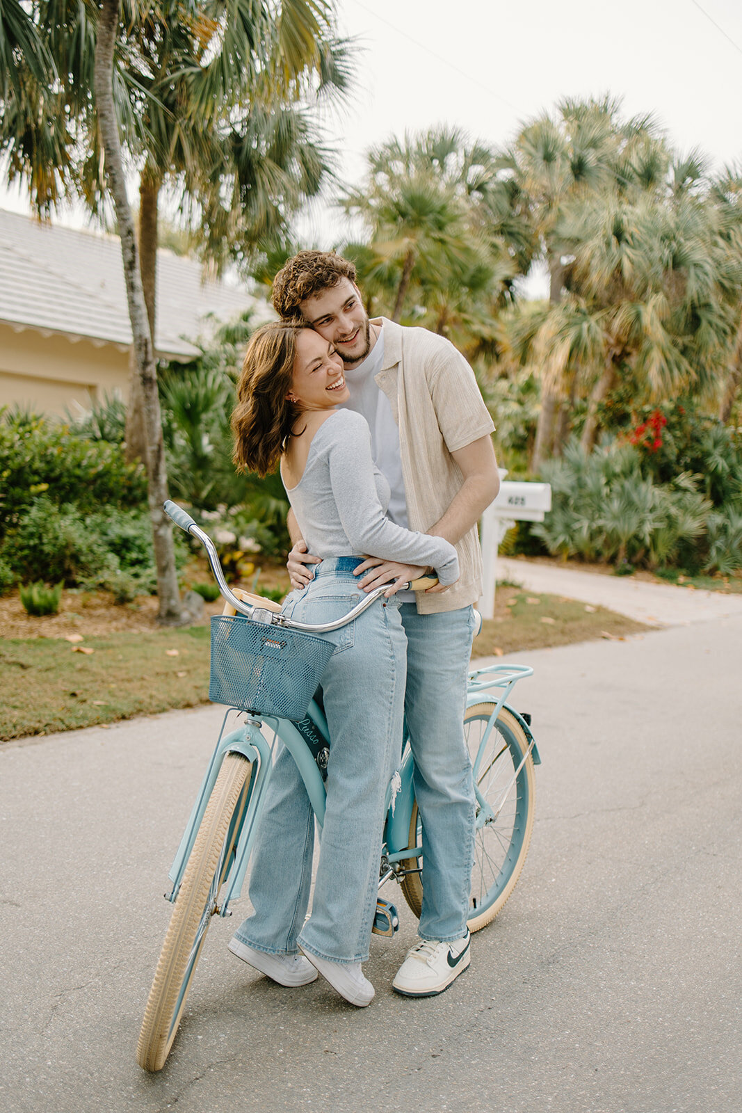 Man and woman go on adventurous engagement session in Sanibel Island.