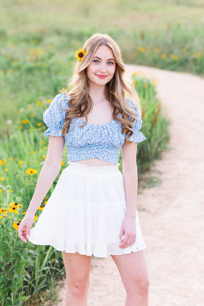 Bright and airy senior photography session in a flower field in Raleigh, NC.