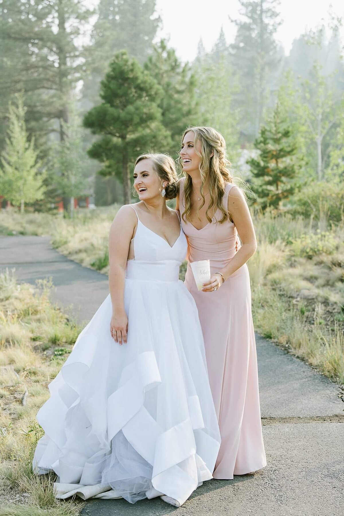 Candid moment of ehr bride nad sister at Martis Camp during wedidng