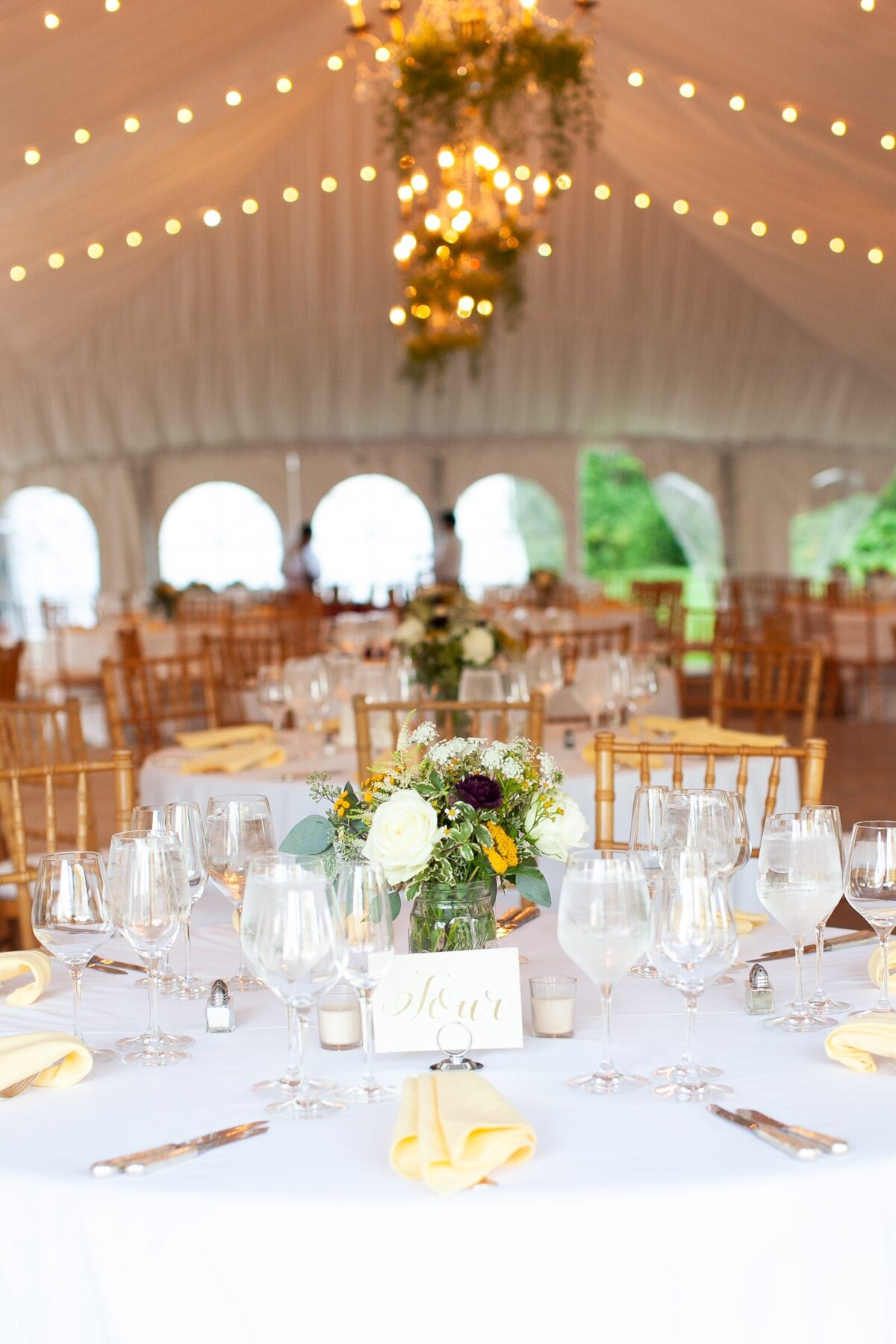 tented-wedding-decor-gold-chivari-chairs