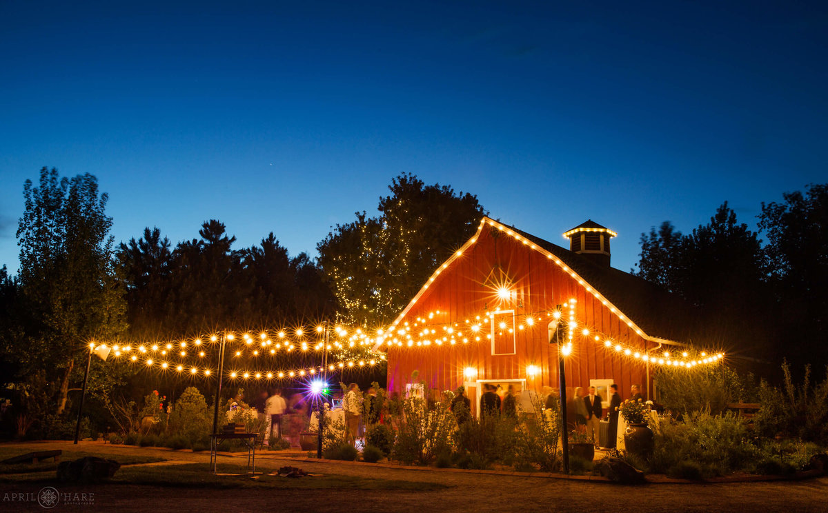 Denver's Best Wedding photographer Chatfield Farms Lit up at Dusk