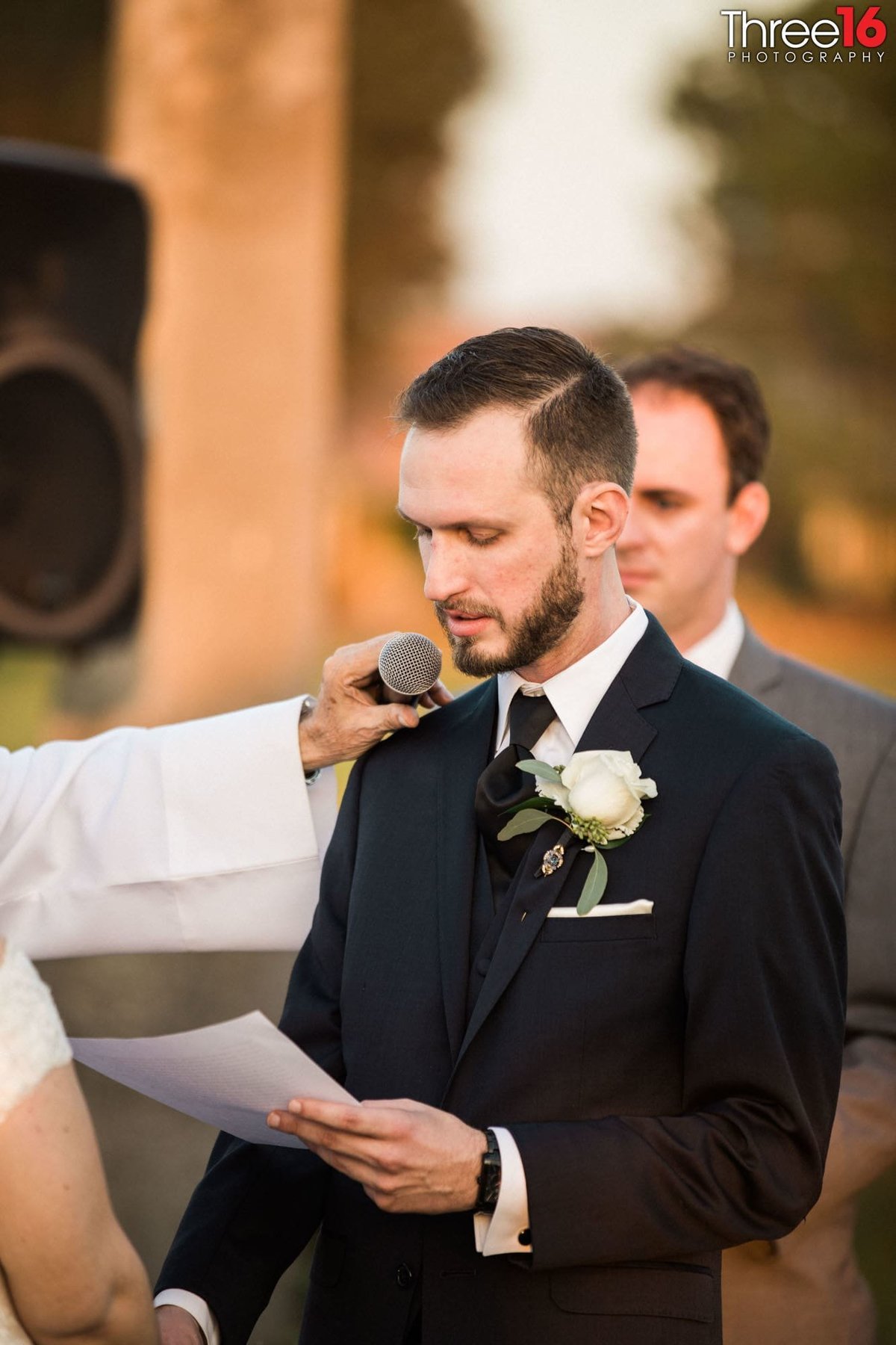 Groom reads his vows to his Bride during the ceremony