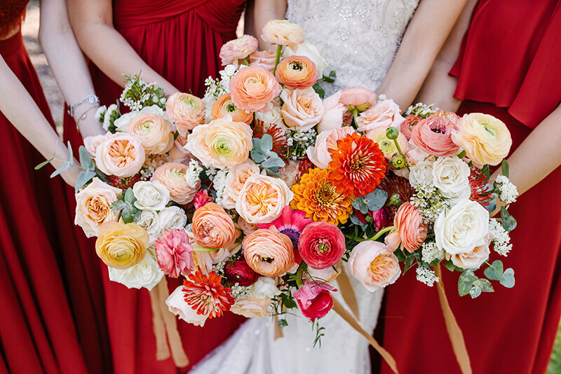 Colorful bouquets in Phoenix wedding by Phoenix wedding photographer, Meredith Amadee Photography