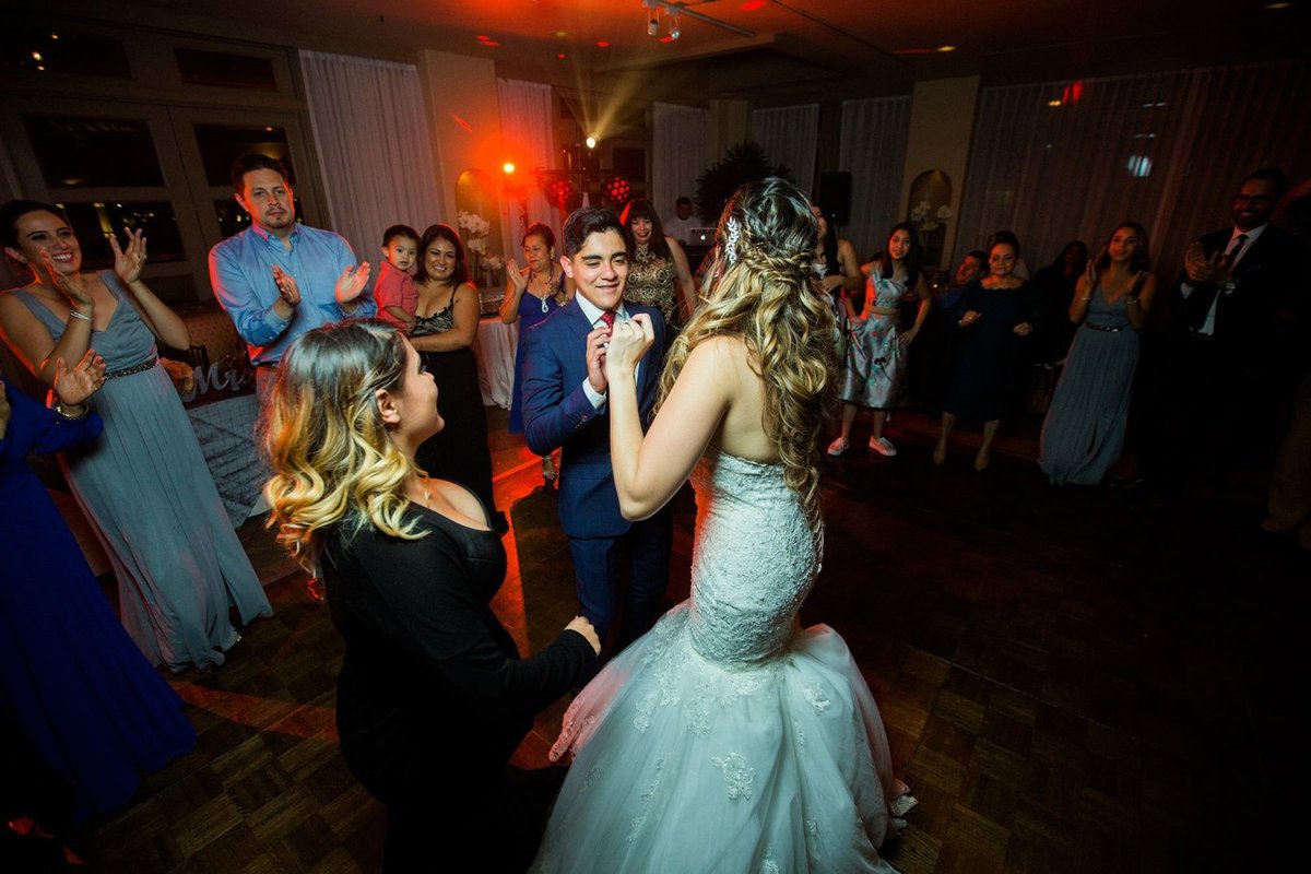Guests join the Bride on the dancefloor