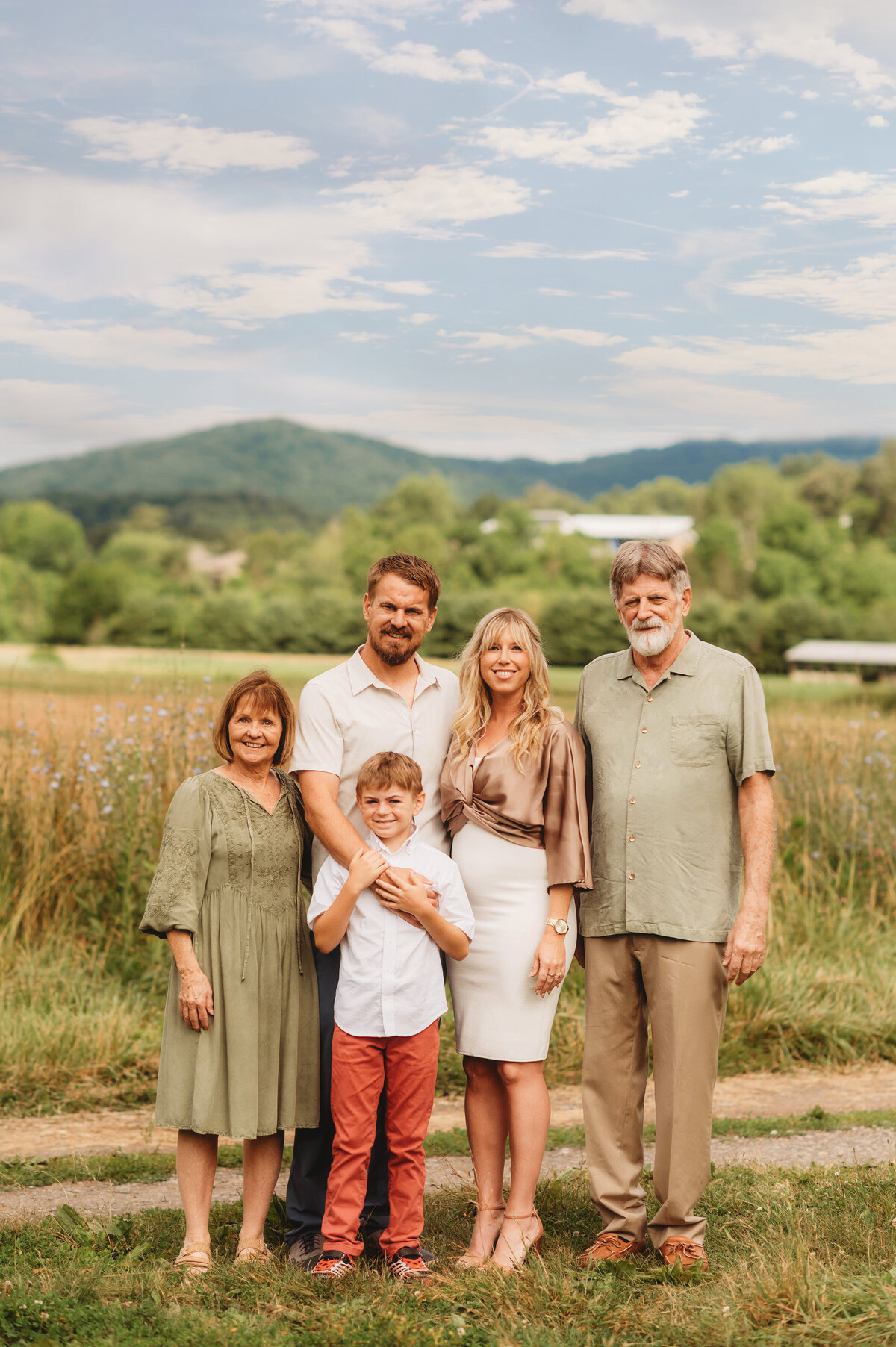 Grandparents pose with their grandchildren during Extended Family Photos in Asheville, NC.