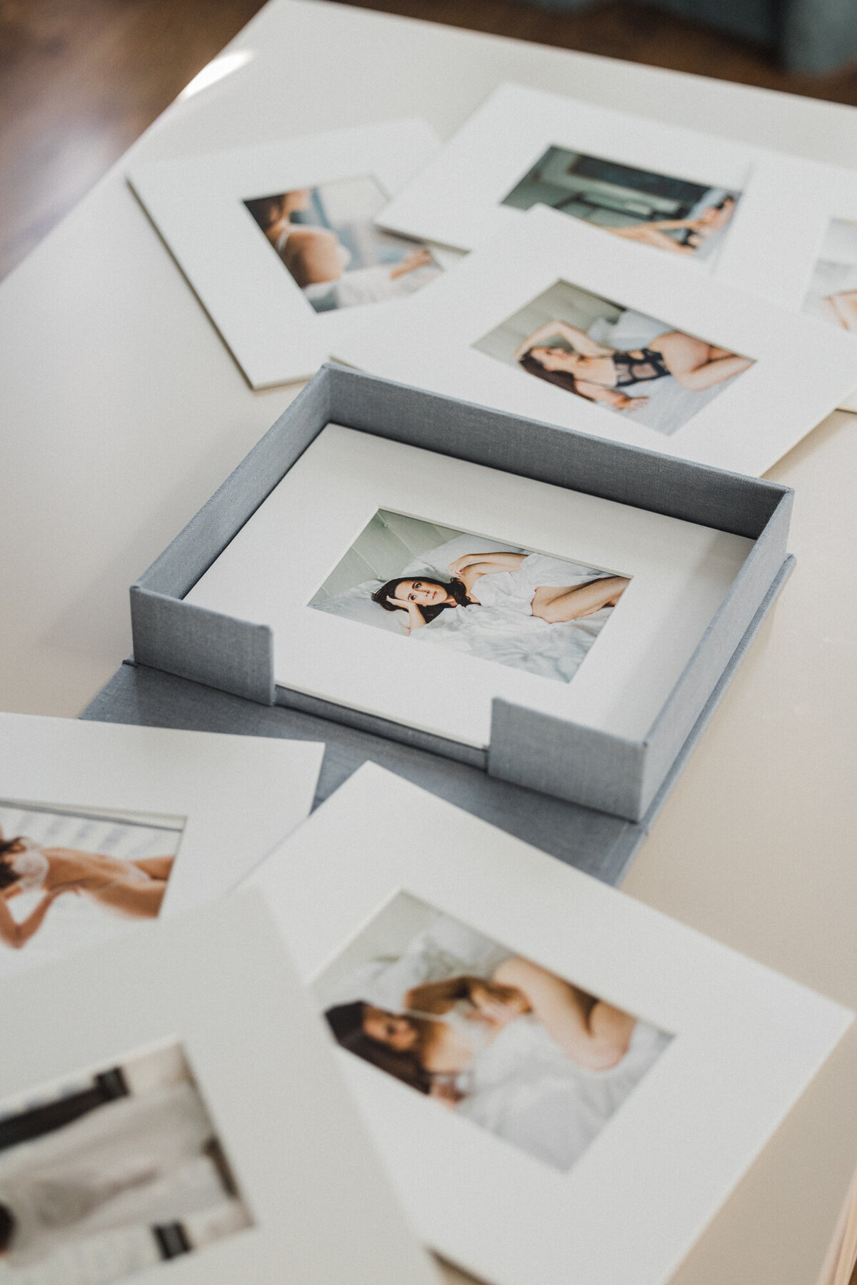 A set of matted prints from a boudoir session