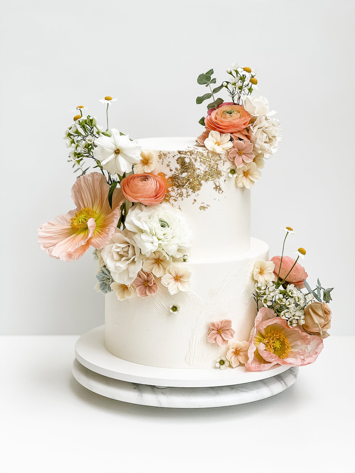 buttercream fresh flower wedding cake