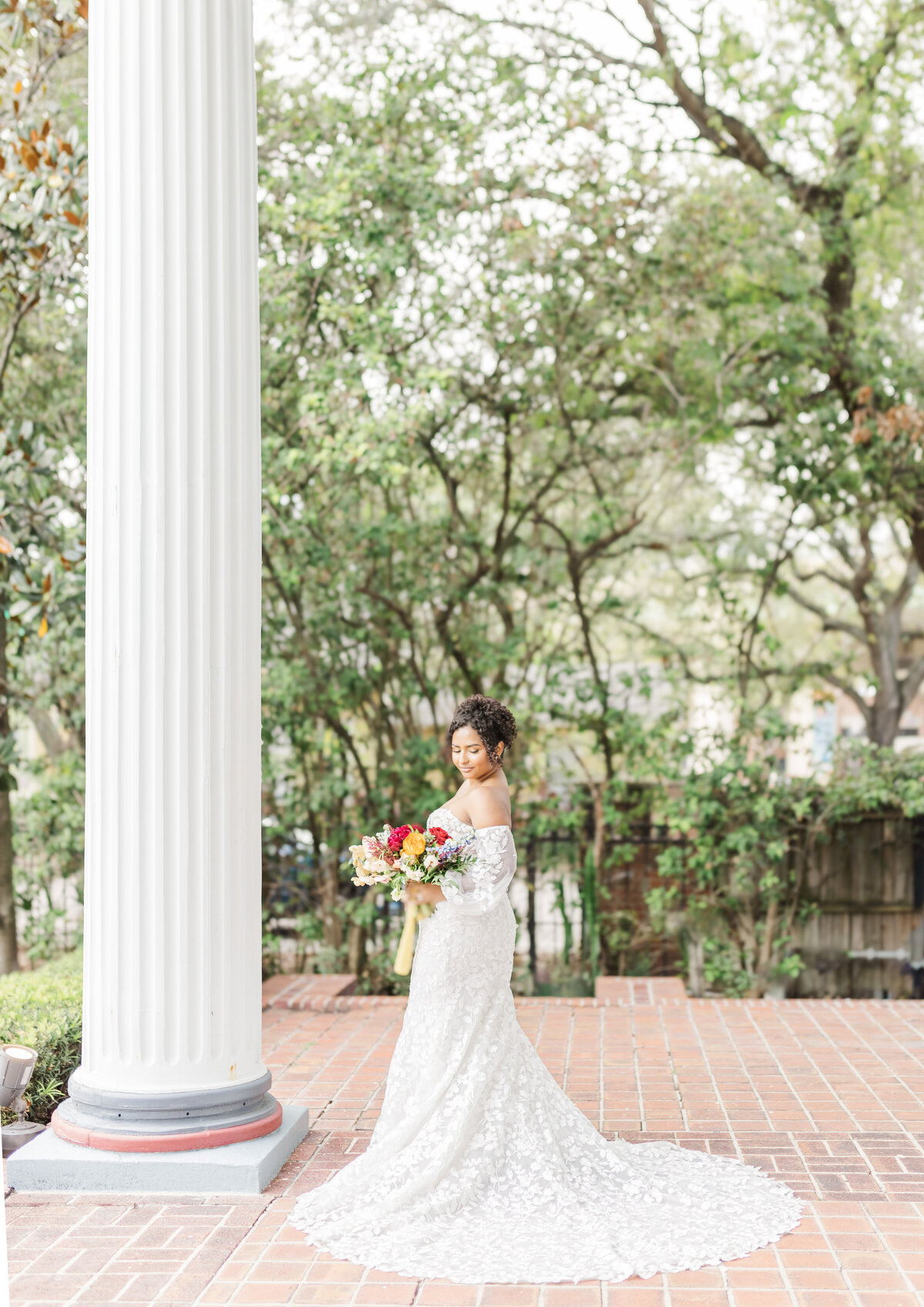 photo of bride highlighting her wedding dress
