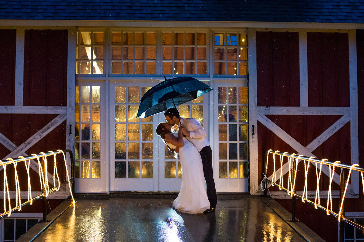 A wonderful use of rain and light to create a one of a kind wedding photograph for a wonderful couple