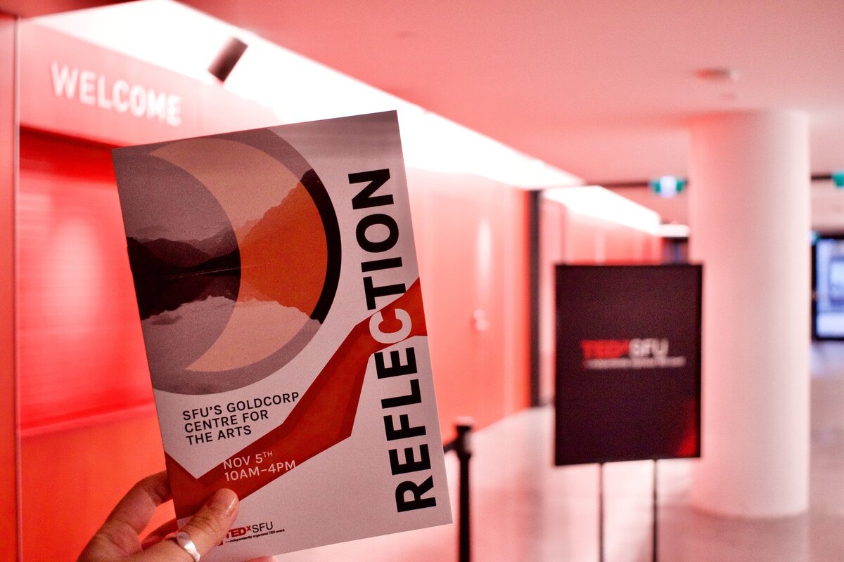 Cover of event program of TEDxSFU theme of Reflection