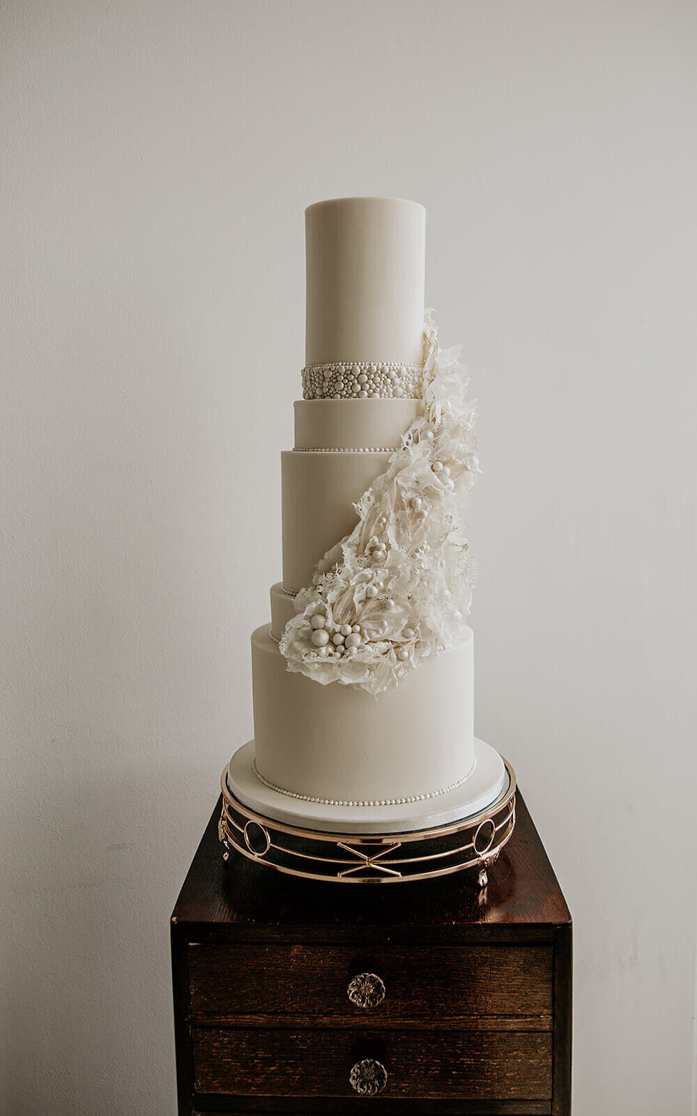 5 tier white wedding cake.  Turner contemporary wedding