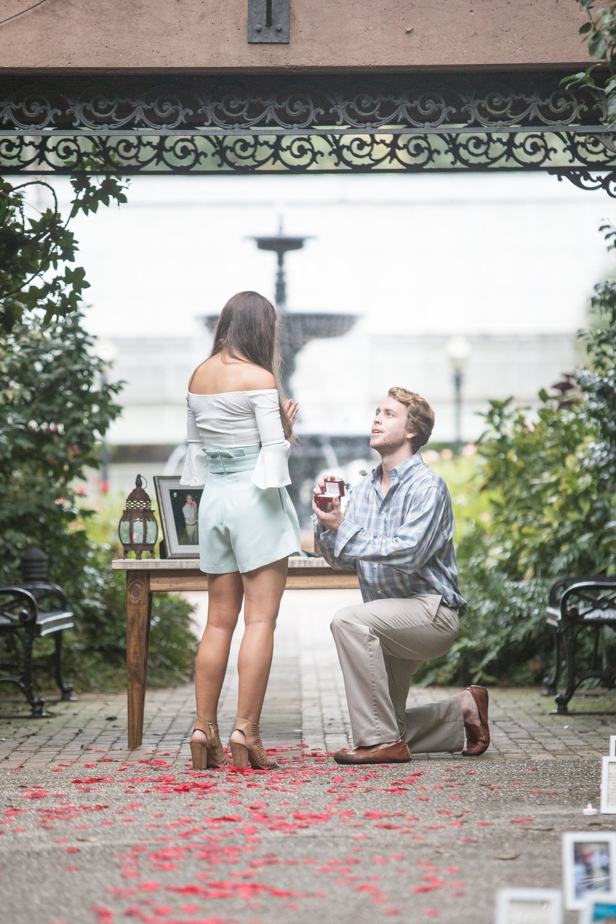 Eric proposes to Katherine on one knee at Bellingrath Gardens in Theodore, Alabama.