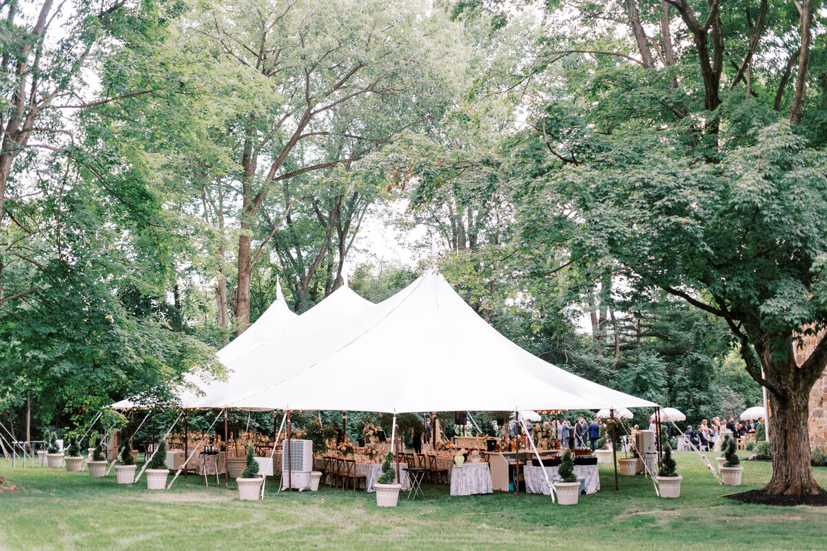 Canvas wedding tent with wooden poles
