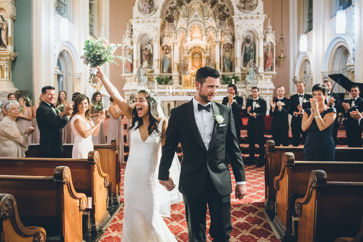 Bride and groom at their ceremony at St Michael Catholic Church in Chicago