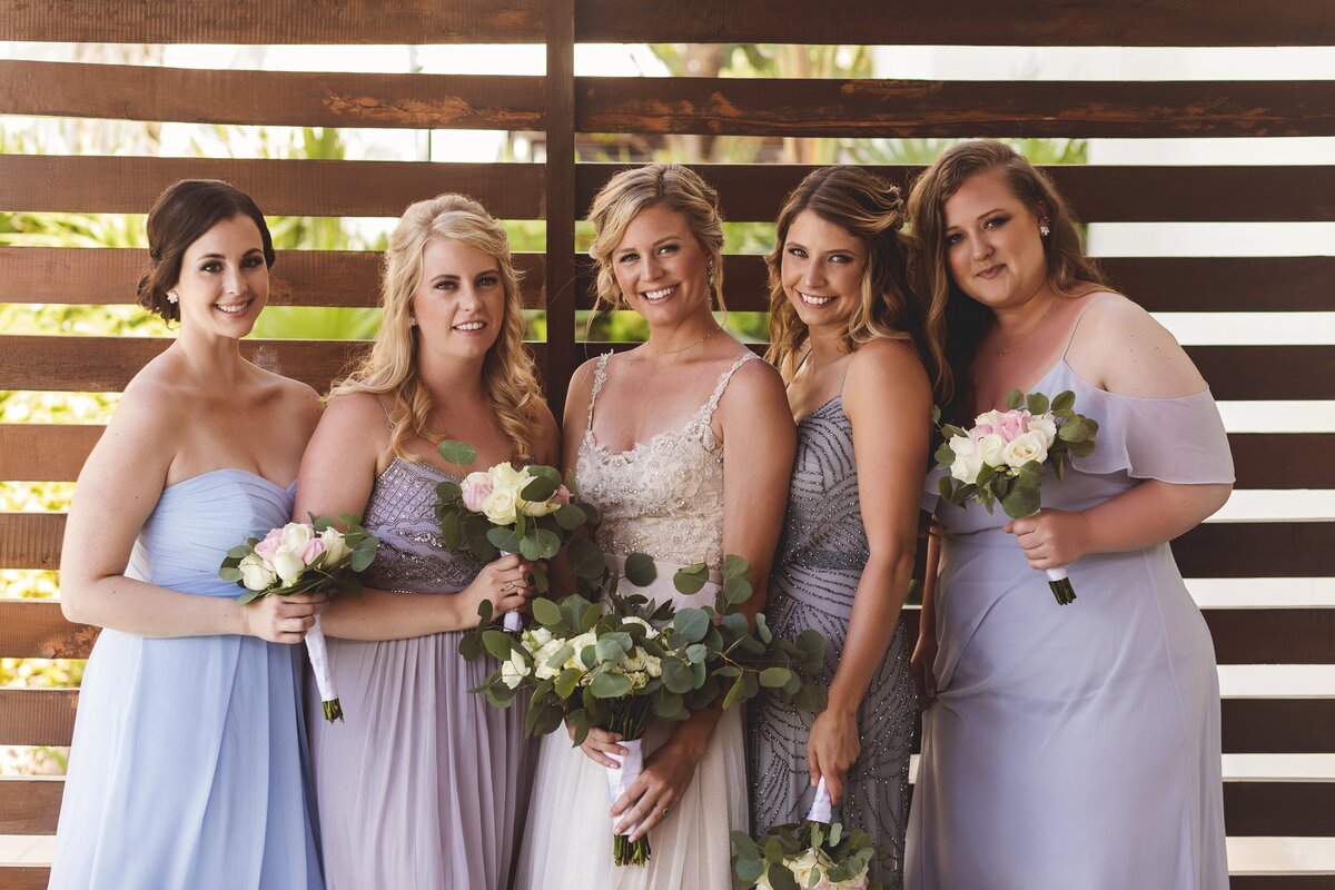 Portrait of bride with bridesmaids at wedding in Cancun