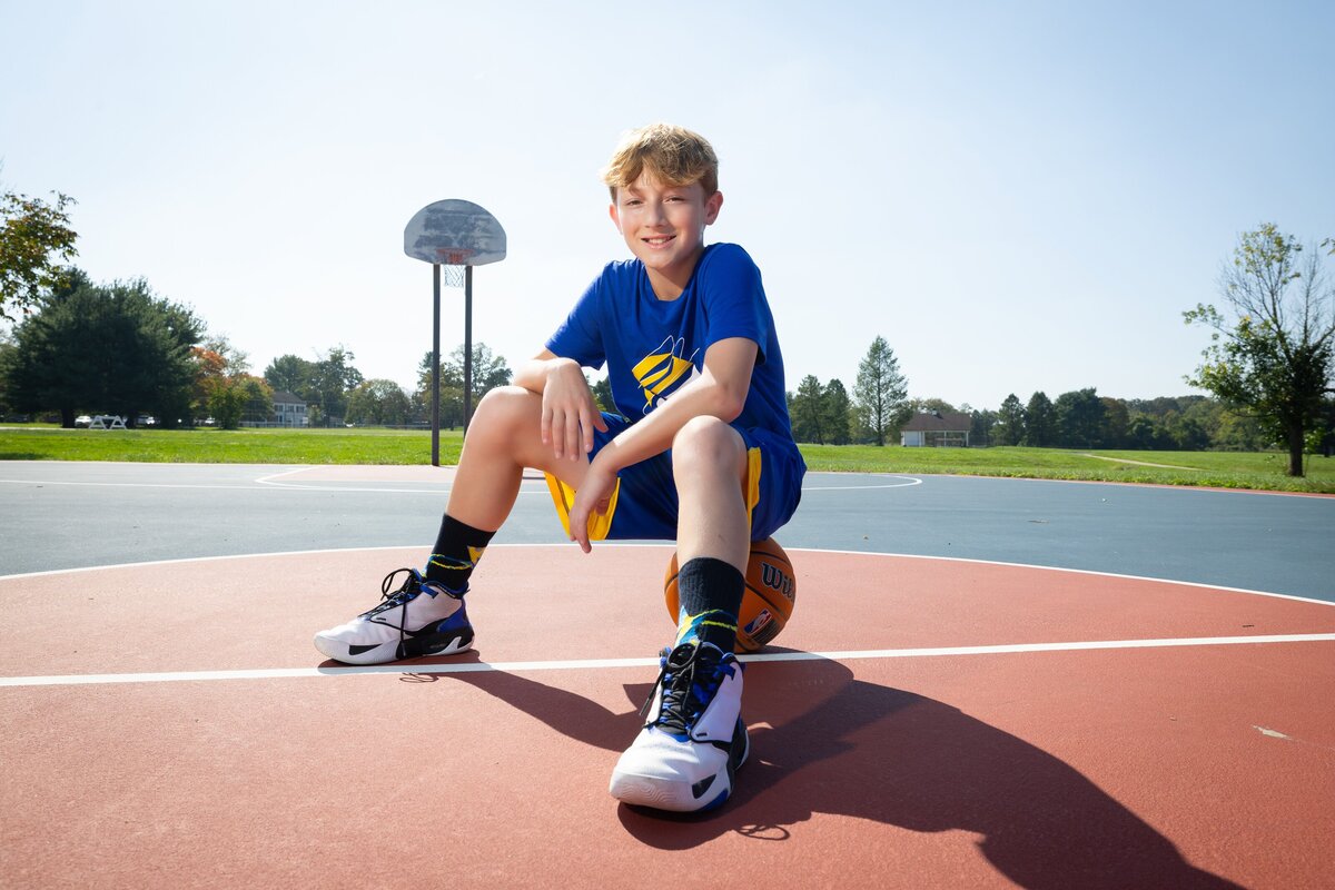 bar-mitzvah-boy-sitting-on-basketball-dorbrook-rec-center