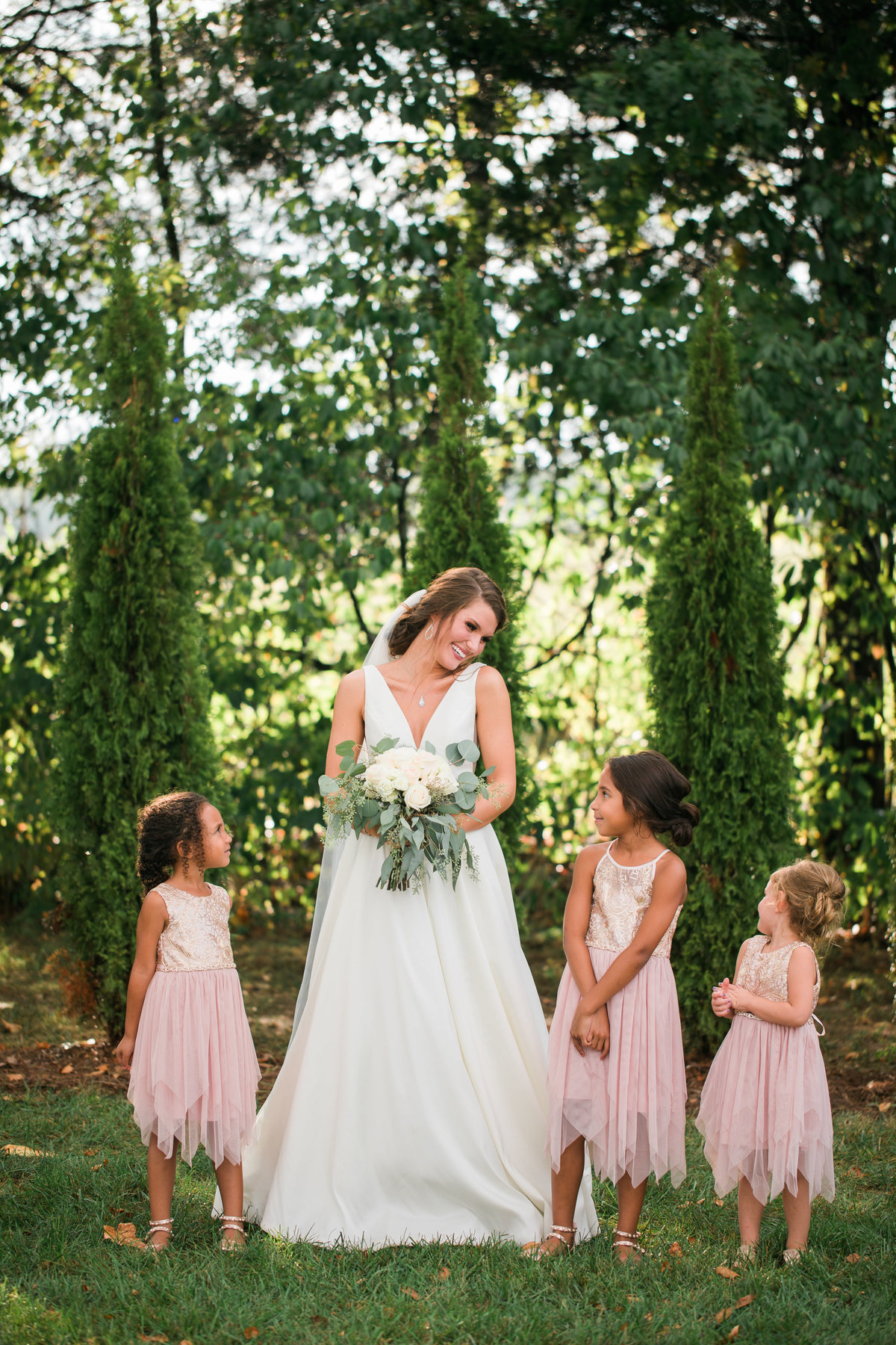 Bride with flower girls.