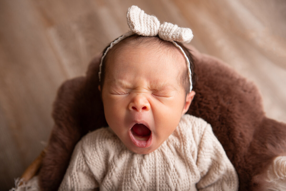 Studio newborn yawn shot