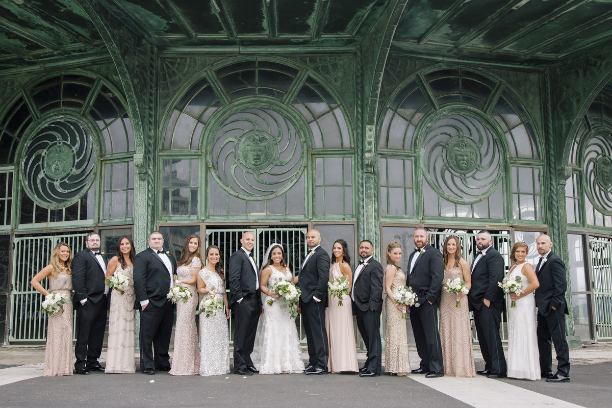 bridal party in front of carousel  at asbury park wedding