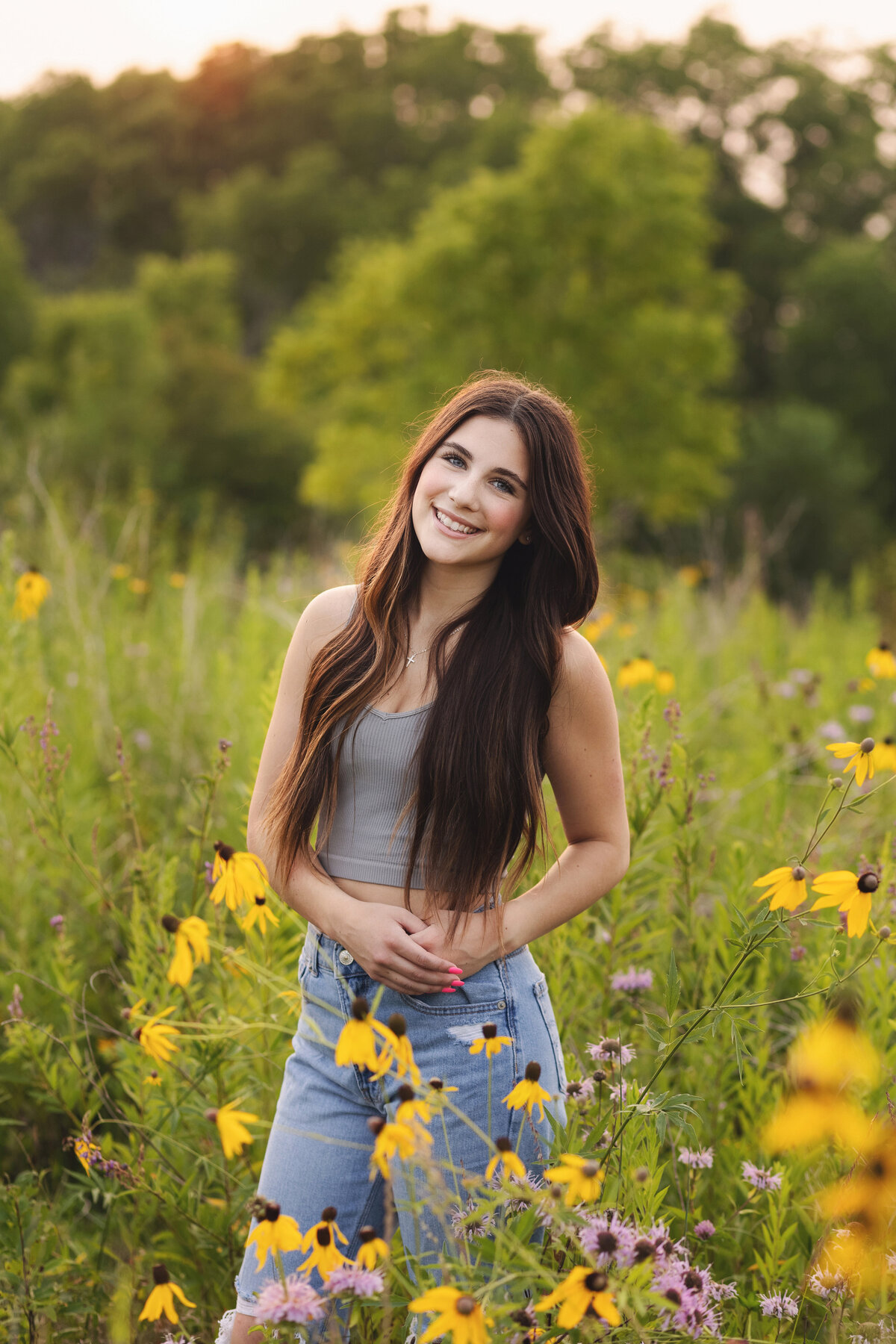 high school girl in field of flowers in eagan