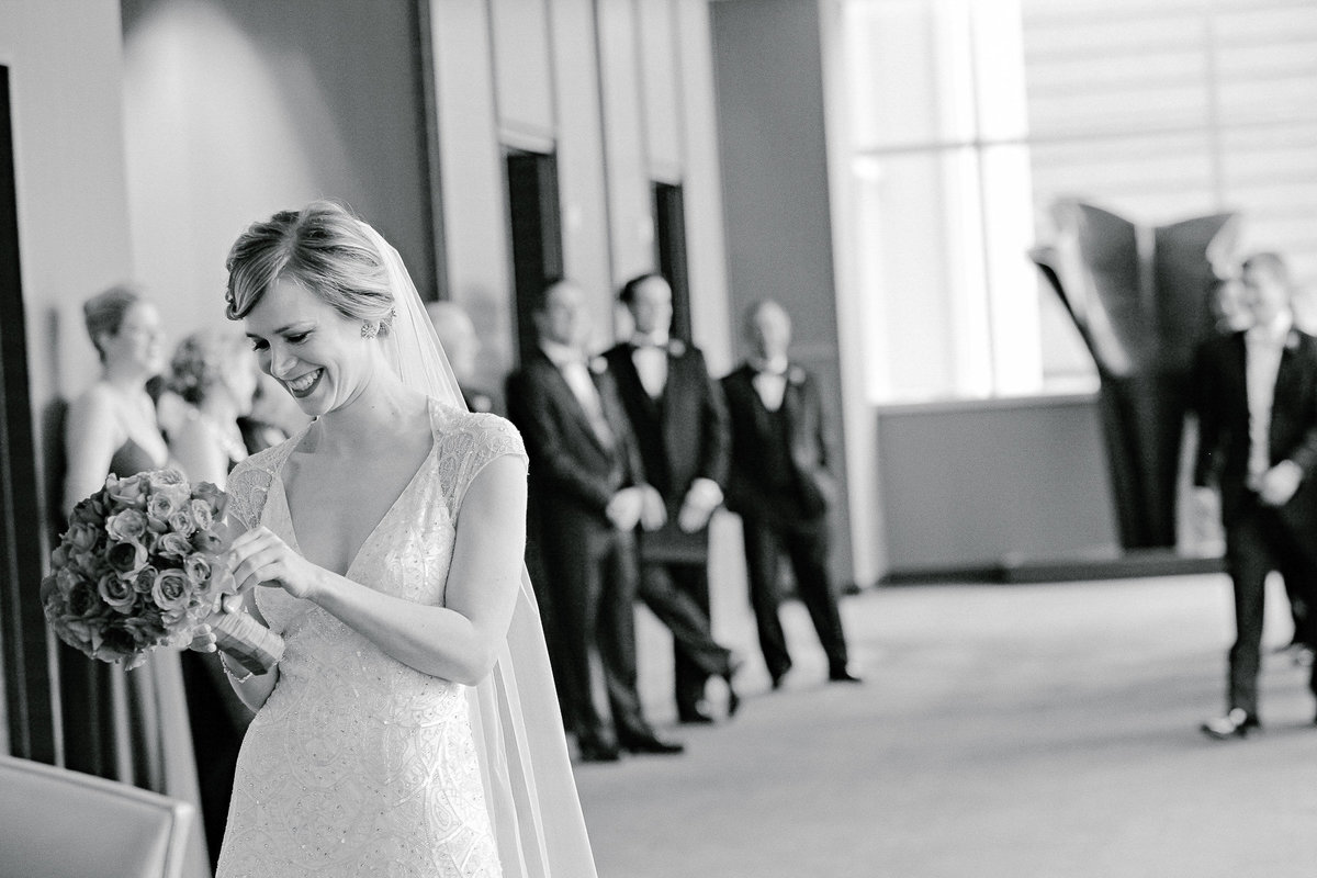 A bride and groom seeing each other for the first time on their wedding day at the St. Regis Hotel in San Francisco.