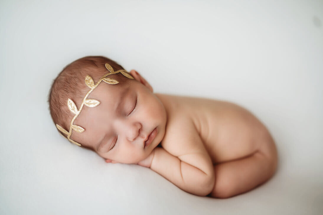 Baby posed for Newborn Photos in Asheville Newborn Photo Studio.