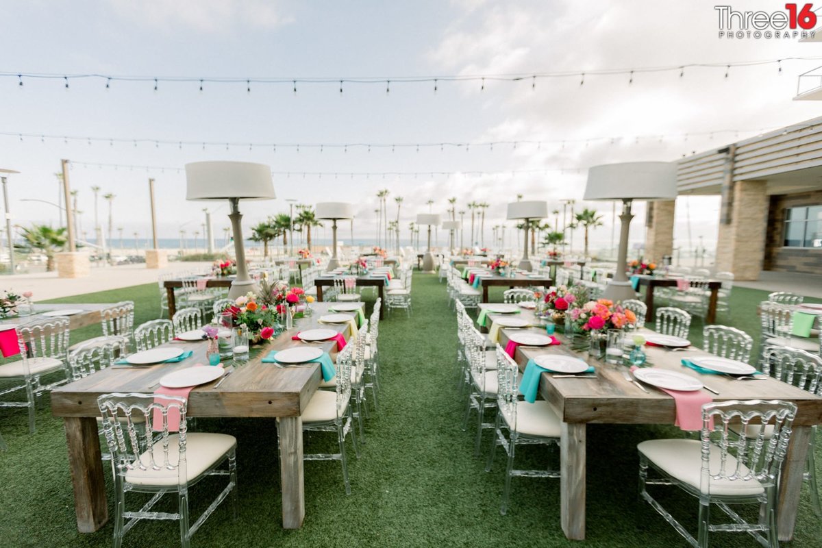 Dinner service setup for wedding reception on the roof of the Pasea Hotel in Huntington Beach