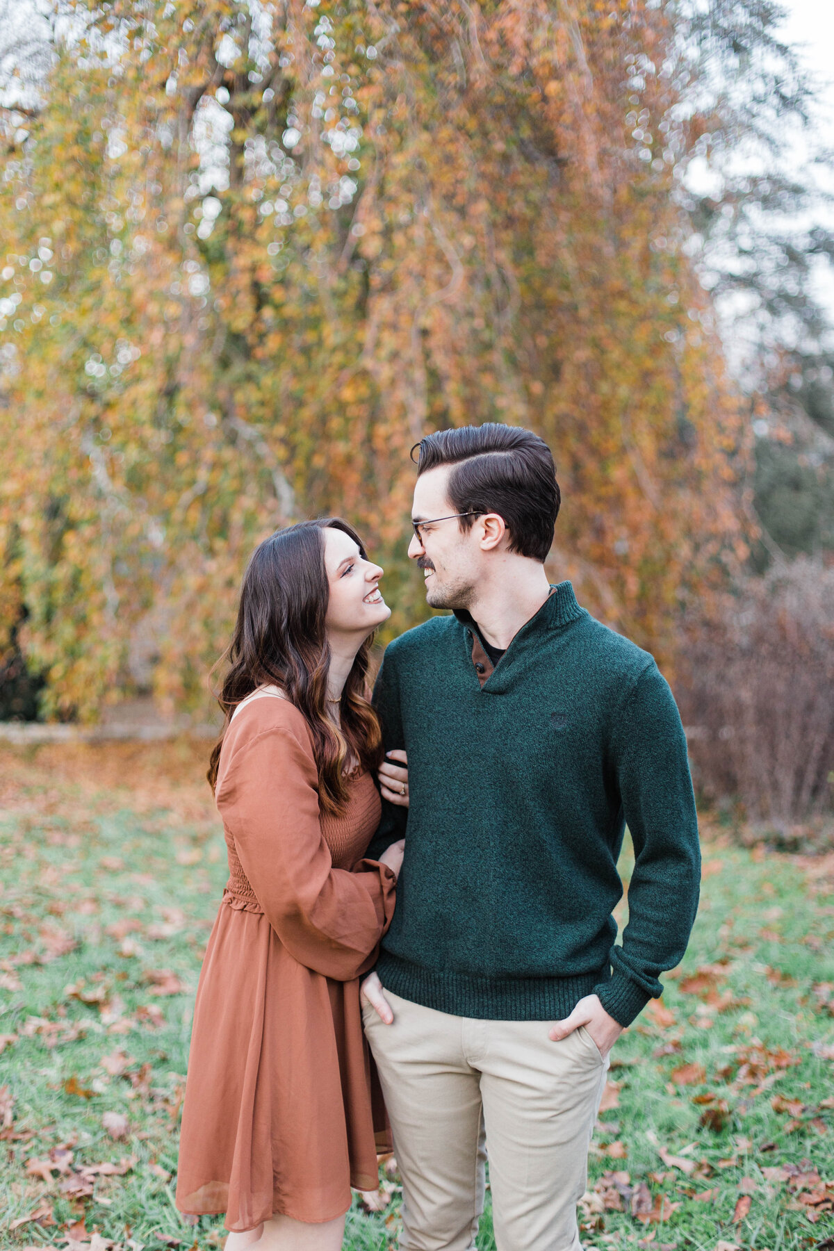 engaged couple posing for photos at Knoxville engagement session