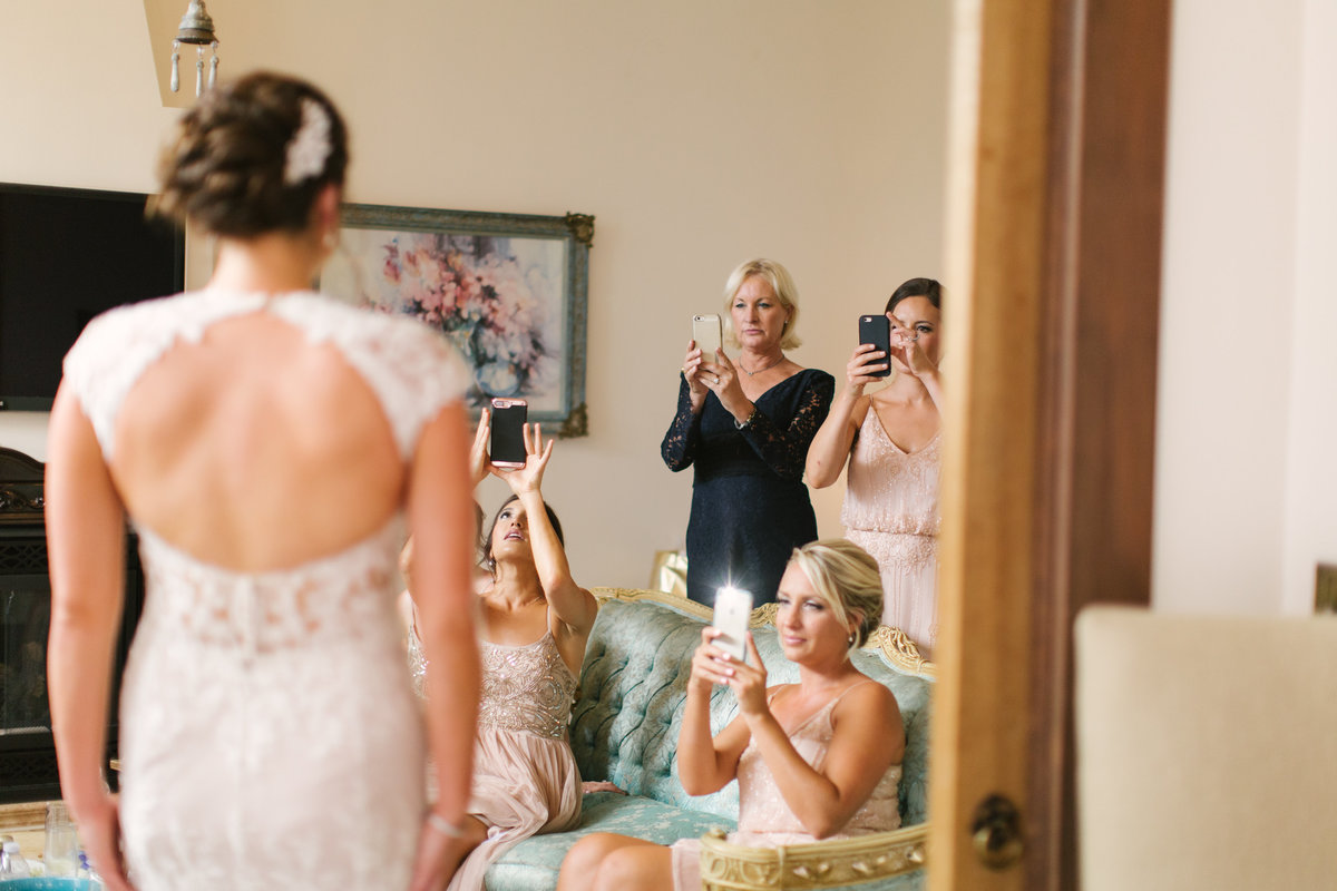 First look with bridesmaids at 1880 Union Hotel Wedding